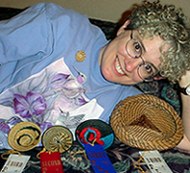 Pamela Zimmerman with awards taken at the 2002 North Carolina Basketmakers Association Convention